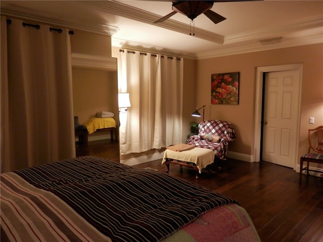 bedroom with ceiling fan, dark hardwood / wood-style floors, and crown molding