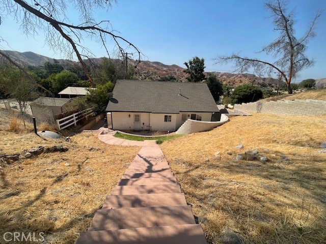 exterior space featuring a mountain view