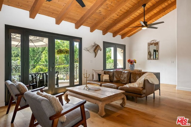 living room featuring wooden ceiling, french doors, vaulted ceiling with beams, ceiling fan, and light wood-type flooring