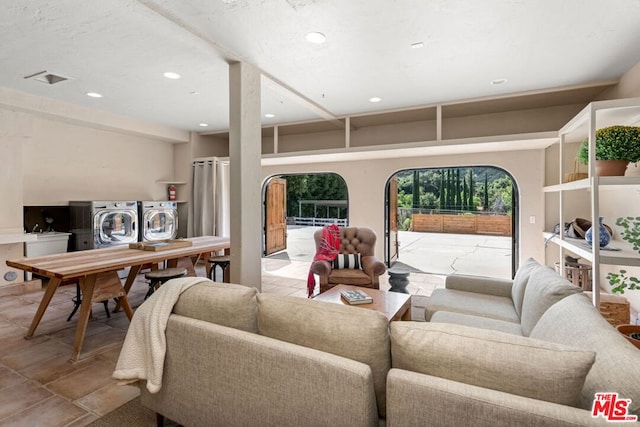 living room featuring washer and dryer