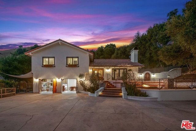 view of mediterranean / spanish house