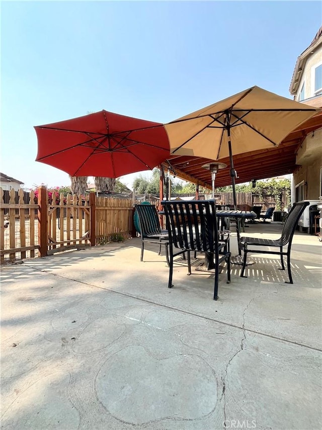 view of patio / terrace with fence