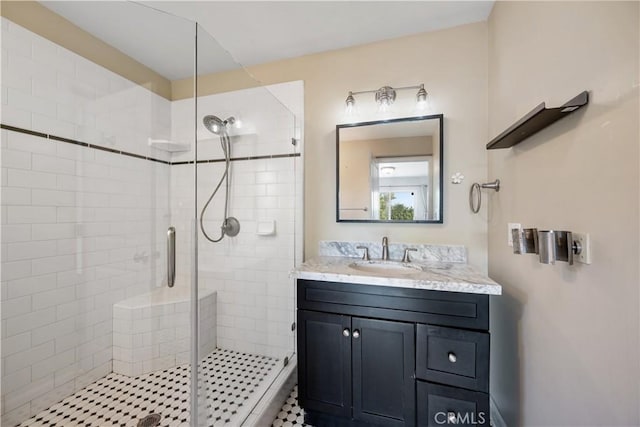 bathroom with vanity and walk in shower