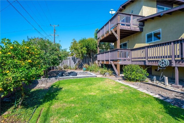 view of yard featuring a deck