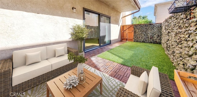 balcony with outdoor lounge area and a patio area