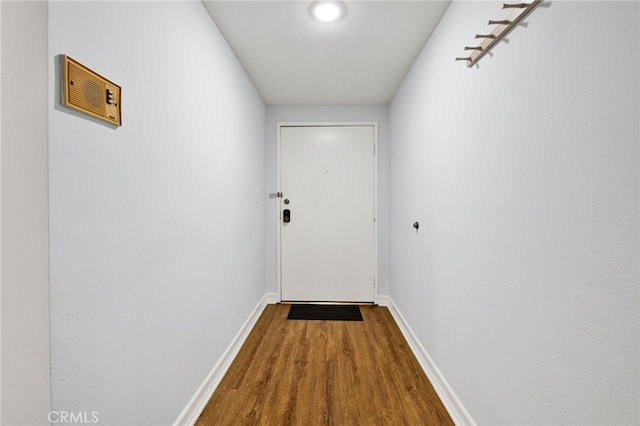 doorway to outside featuring hardwood / wood-style floors