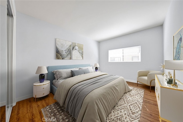 bedroom featuring hardwood / wood-style flooring