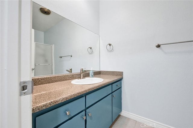 bathroom with vanity and tile patterned floors