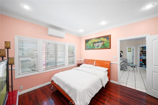 bedroom with a wall mounted air conditioner, ornamental molding, and dark wood-type flooring