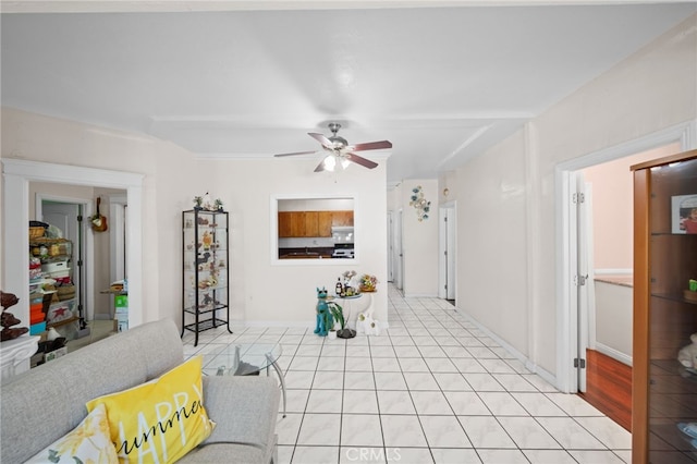 living room featuring light wood-type flooring and ceiling fan