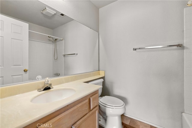 full bathroom with vanity, tile patterned flooring, toilet, and bathtub / shower combination