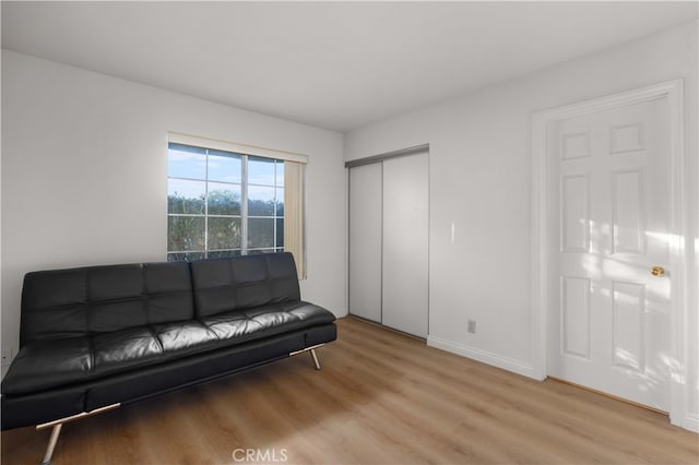 unfurnished living room featuring light hardwood / wood-style flooring