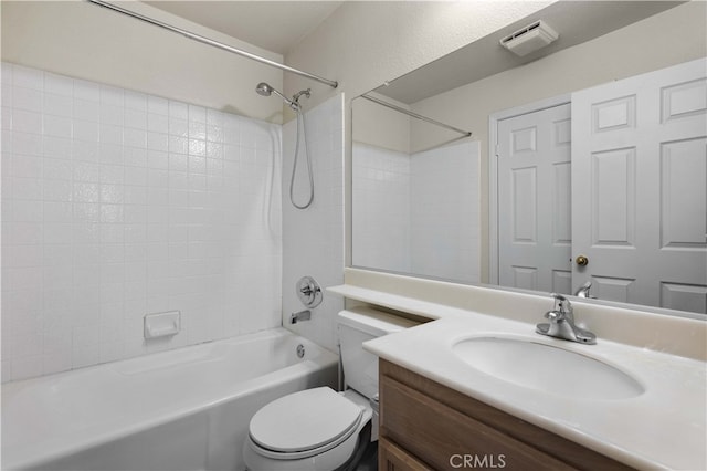 full bathroom featuring shower / bathtub combination, vanity, and toilet