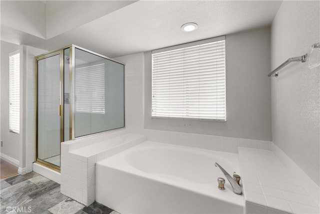 bathroom with plus walk in shower