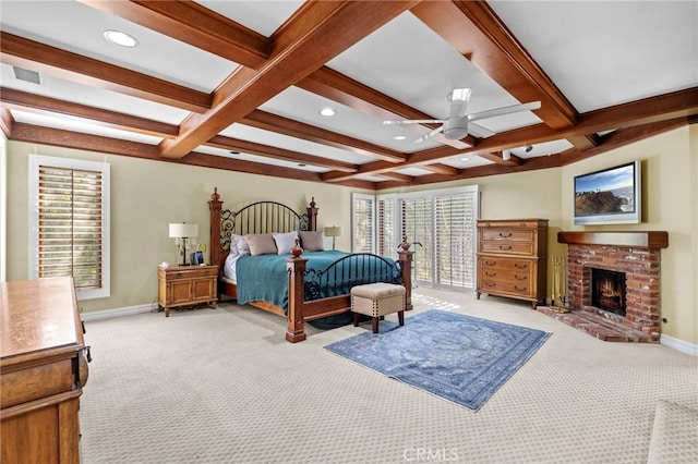 bedroom with light carpet, multiple windows, and ceiling fan