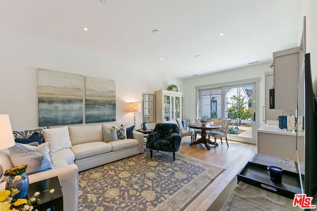 living room featuring light wood-type flooring