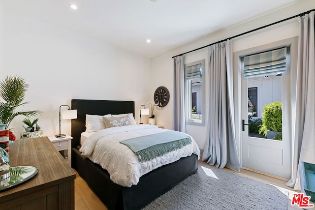 bedroom with light wood-type flooring