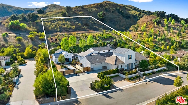 drone / aerial view with a mountain view