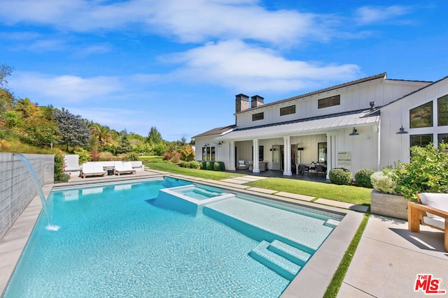 view of pool with an outdoor living space, a patio area, and an in ground hot tub