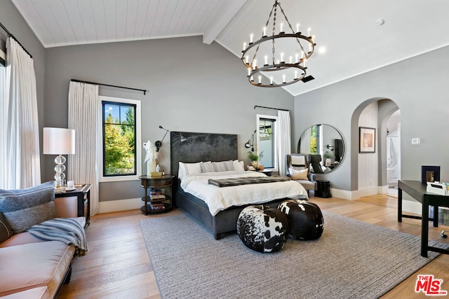 bedroom with beamed ceiling, high vaulted ceiling, wood ceiling, and light hardwood / wood-style floors