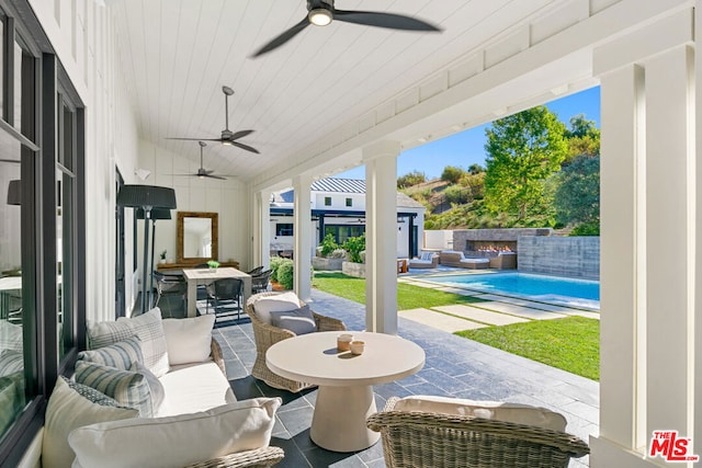 view of patio / terrace with an outdoor hangout area and ceiling fan