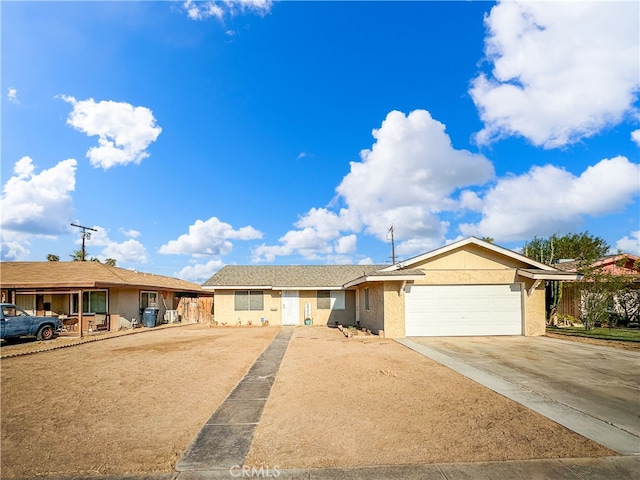 ranch-style home featuring a garage