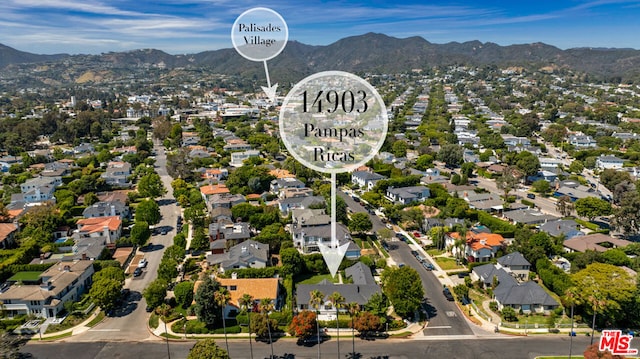 bird's eye view with a mountain view