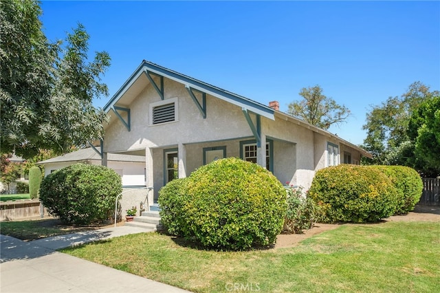 view of front of home with a front yard