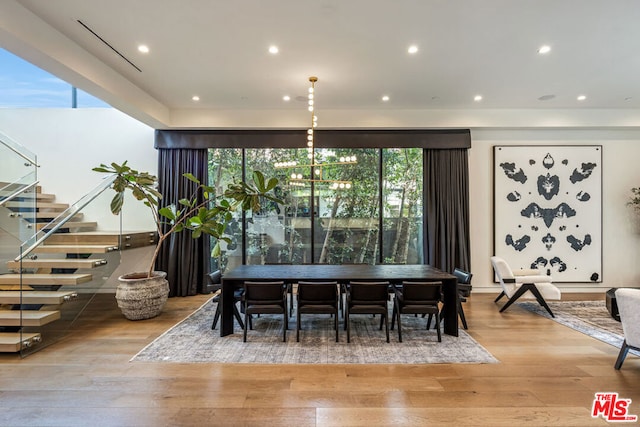 dining area with hardwood / wood-style flooring