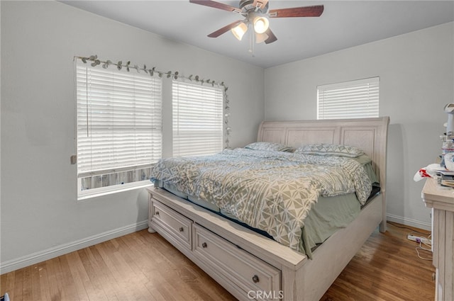 bedroom featuring ceiling fan and light wood-type flooring