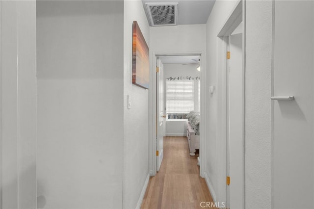 hall featuring light hardwood / wood-style flooring