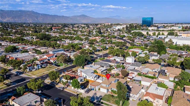 drone / aerial view featuring a mountain view