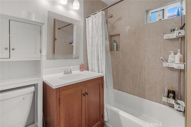 full bathroom with shower / bathtub combination with curtain, toilet, and vanity