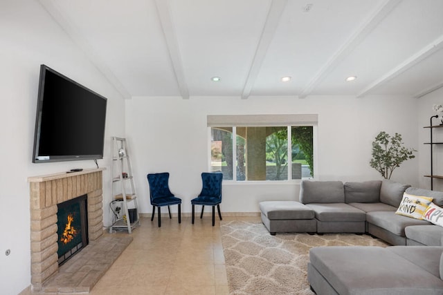 living room with light tile patterned flooring, a fireplace, and lofted ceiling with beams