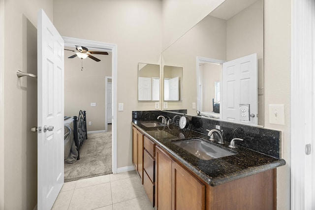 bathroom with ceiling fan, vanity, and tile patterned floors