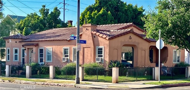 view of front of property featuring cooling unit