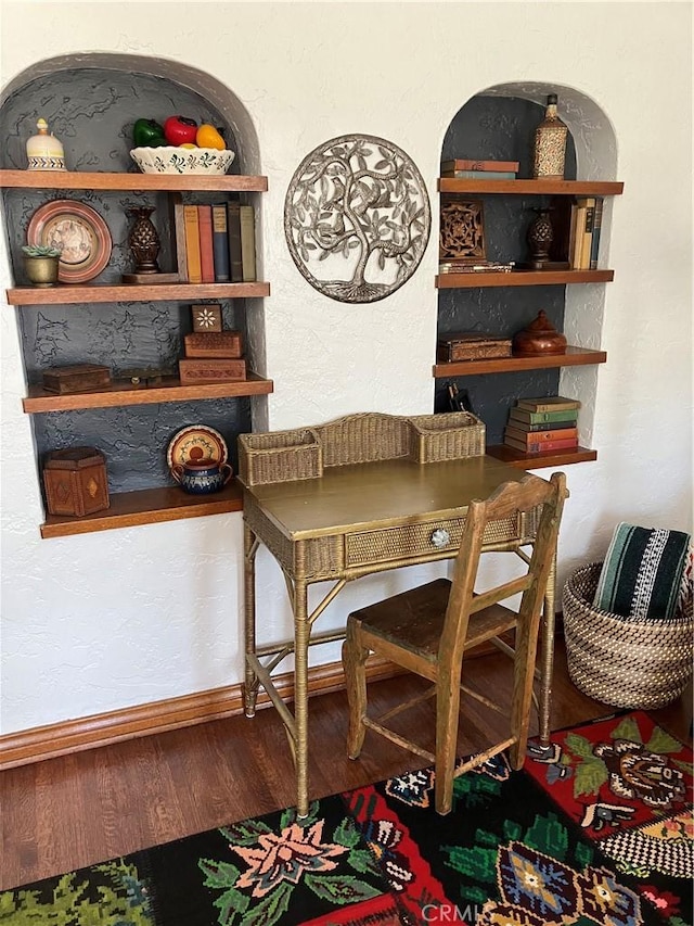 dining space with hardwood / wood-style flooring