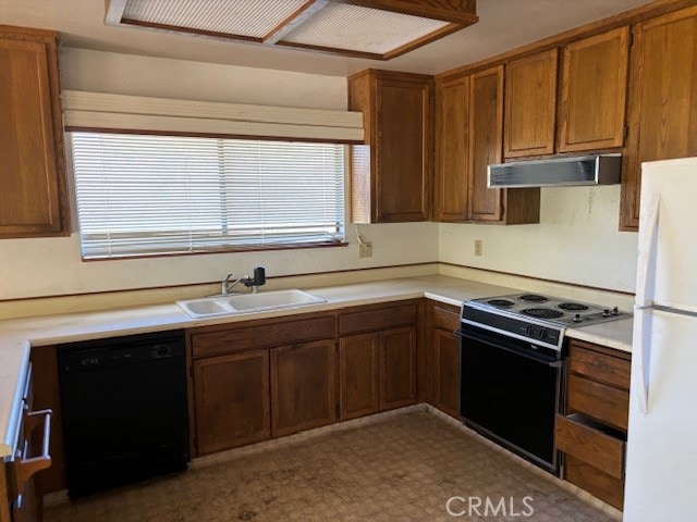 kitchen featuring range with electric stovetop, dishwasher, white fridge, ventilation hood, and sink