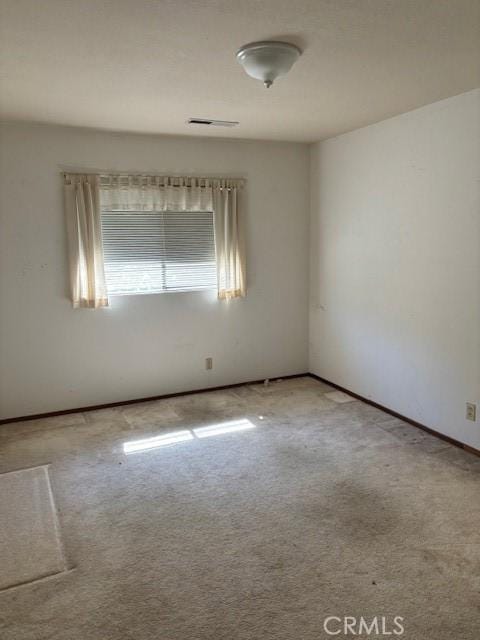 19189 Mountain Mdw N, Hidden Valley Lake, CA 95467 - spare room featuring carpet floors, baseboards, and visible vents