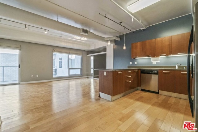 kitchen featuring light hardwood / wood-style flooring, dishwasher, and kitchen peninsula