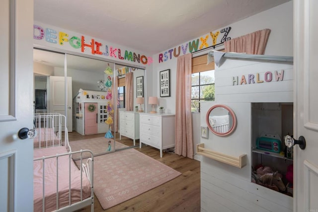 bedroom featuring hardwood / wood-style flooring