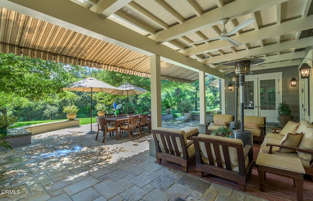 view of patio / terrace featuring outdoor lounge area, ceiling fan, and french doors