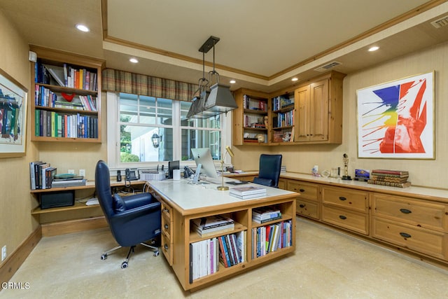 office area featuring built in desk and ornamental molding