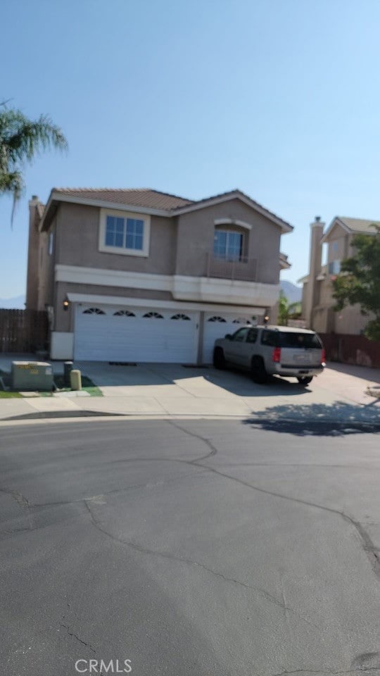 view of property with a garage