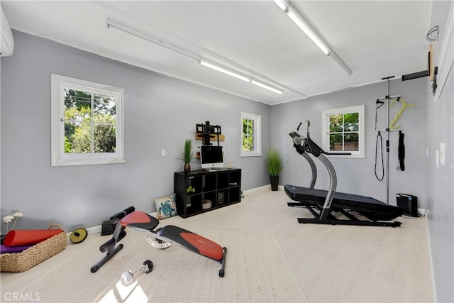 workout room with a wealth of natural light