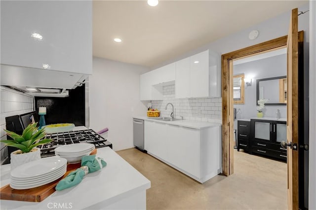 kitchen featuring sink, white cabinets, and stainless steel dishwasher