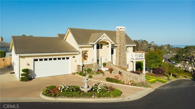 view of front of property with a garage