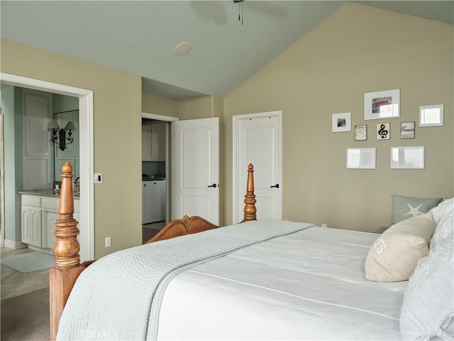 bedroom with lofted ceiling and connected bathroom