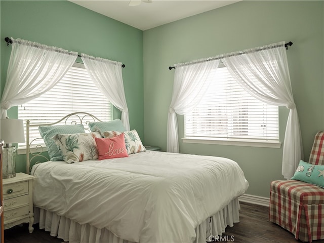 bedroom featuring dark hardwood / wood-style floors