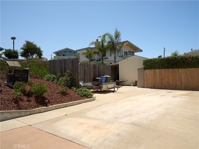 view of property exterior with a patio